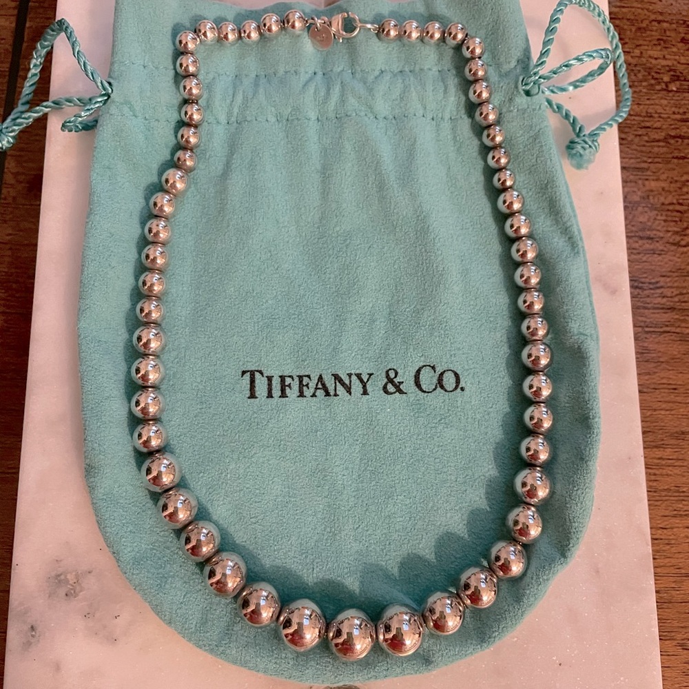 Graduated silver bead 16” necklace by Tiffany’s